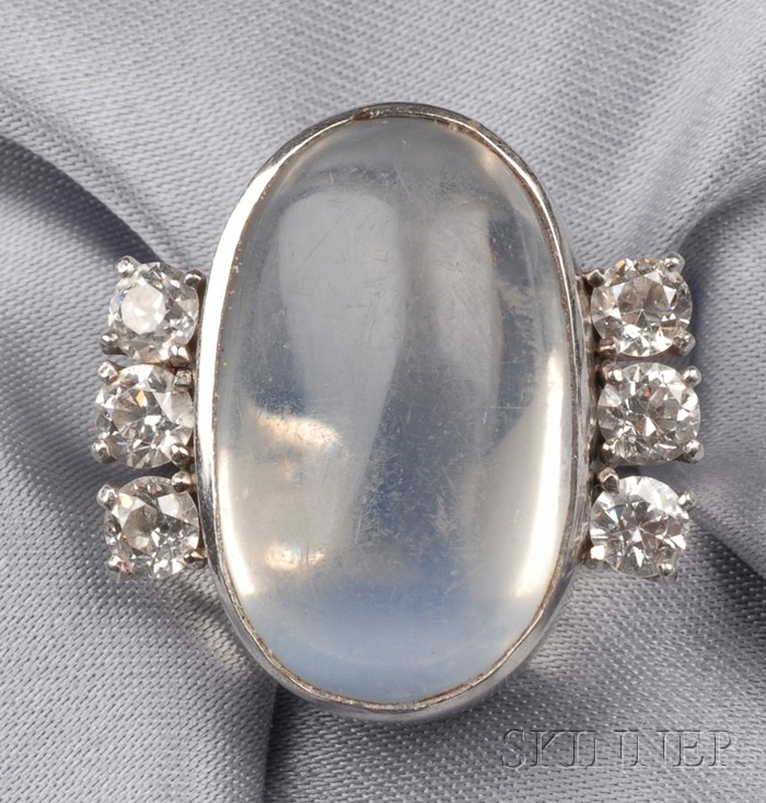 Appraisal: Platinum Moonstone and Diamond Ring bezel-set with a cabochon moonstone