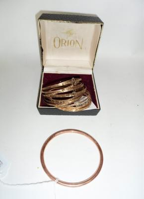 Appraisal: A ct rose gold bangle of plain circular form and