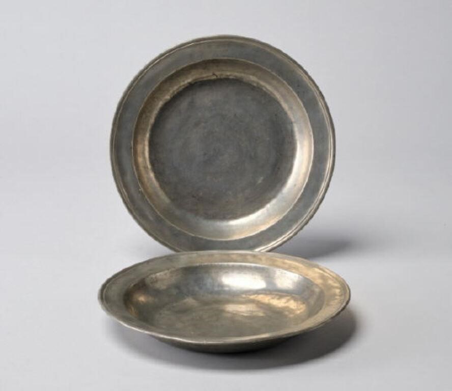 Appraisal: A pair of antique English pewter charger bowls with flat