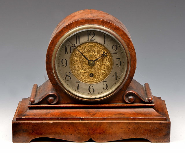 Appraisal: A LATE VICTORIAN DRUM HEAD MANTEL TIMEPIECE with silvered Arabic