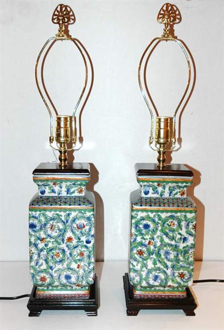 Appraisal: Pair of Chinese Polychrome Decorated Porcelain Lamps Estimate -