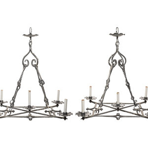 Appraisal: A Pair of Baroque Style Cast Metal Five-Light Ceiling Fixtures