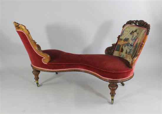 Appraisal: A Victorian carved walnut serpentine conversation seat with portrait tapestry