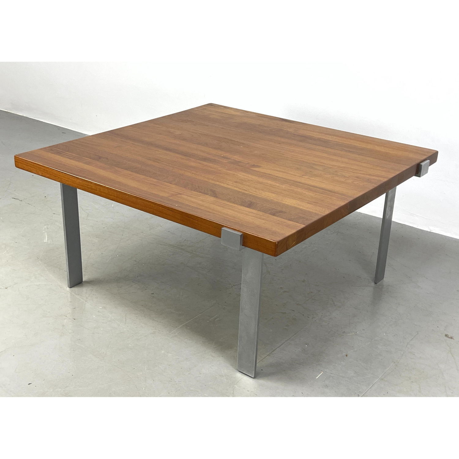 Appraisal: ILLUM WIKKELSO Coffee table with teak top and stainless steel