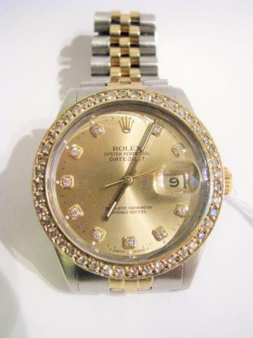 Appraisal: A gentleman's Rolex Datejust Oyster Perpetual with gold dial diamond