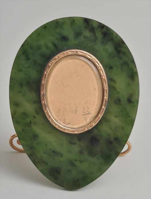 Appraisal: CARVED NEPHRITE AND GOLD PHOTOGRAPH FRAME Marked with Cyrillic initials