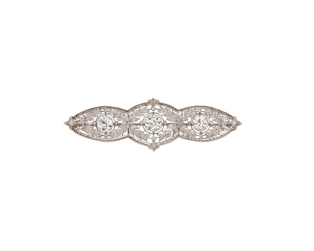 Appraisal: Platinum and Diamond Brooch the open-work floral and vine motif