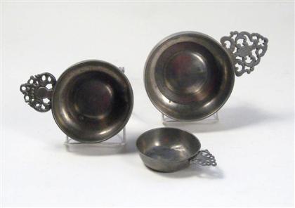 Appraisal: Three pewter porringers connecticut th century Varying sizes each with