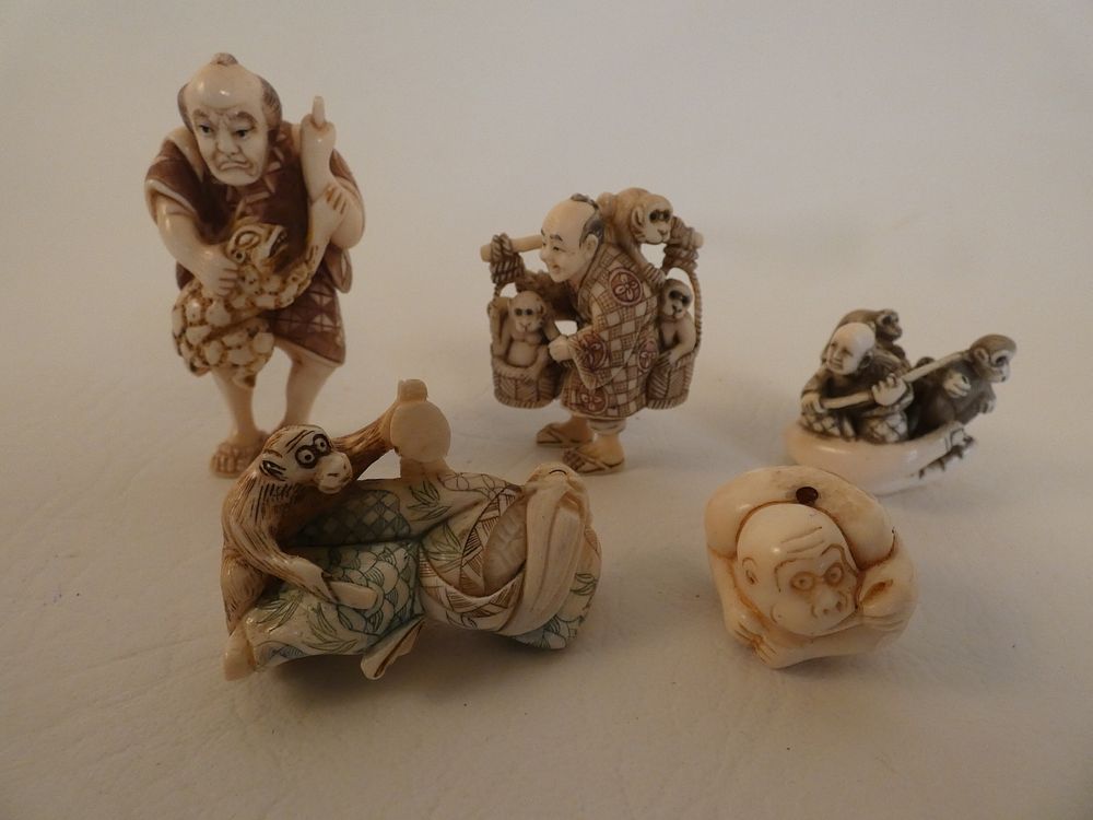 Appraisal: JAPANESE NETSUKES - MONKEYS Lot old Japanese carved bone netsukes