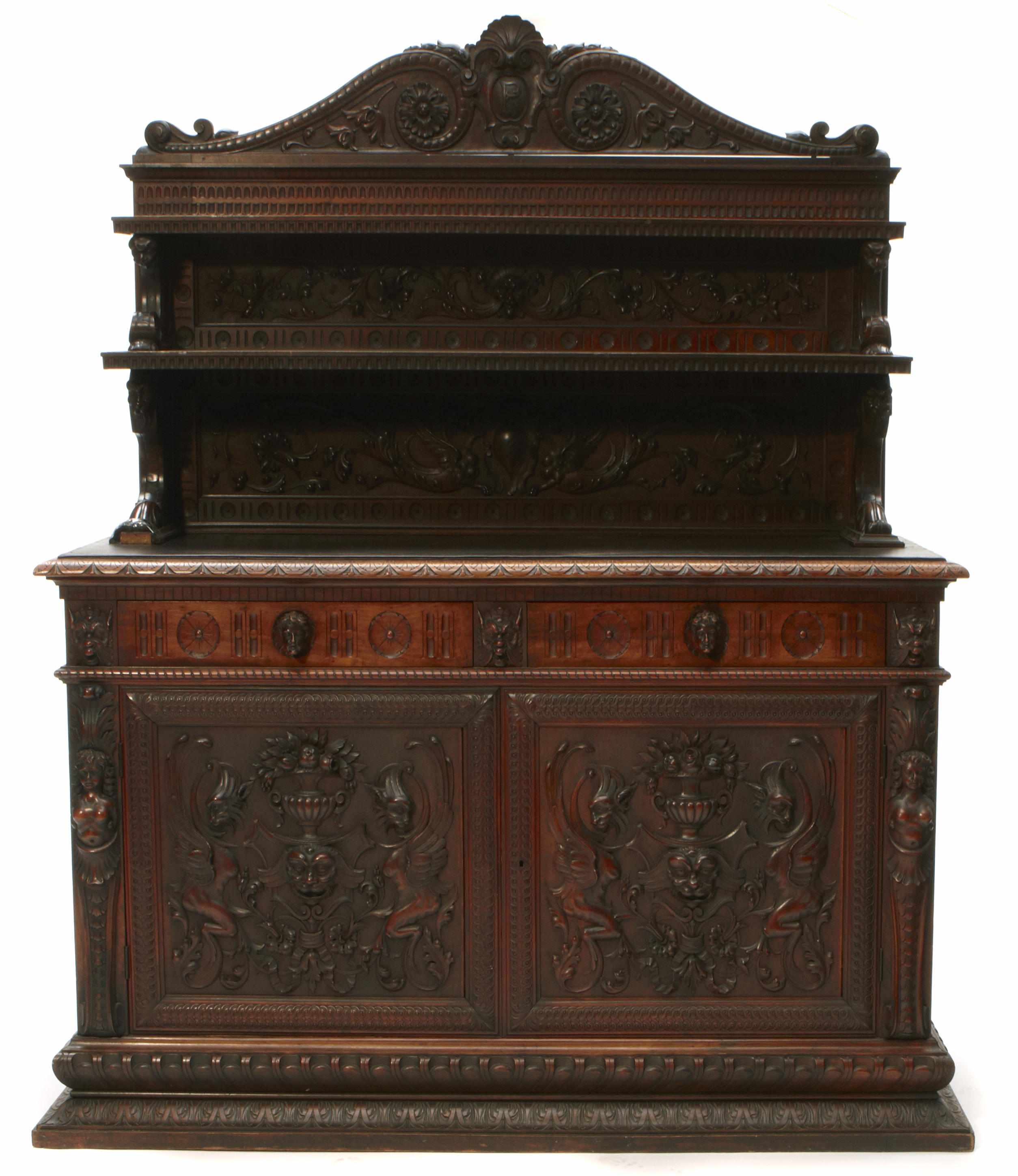 Appraisal: A Continental Renaissance Revival walnut side cupboard height in width