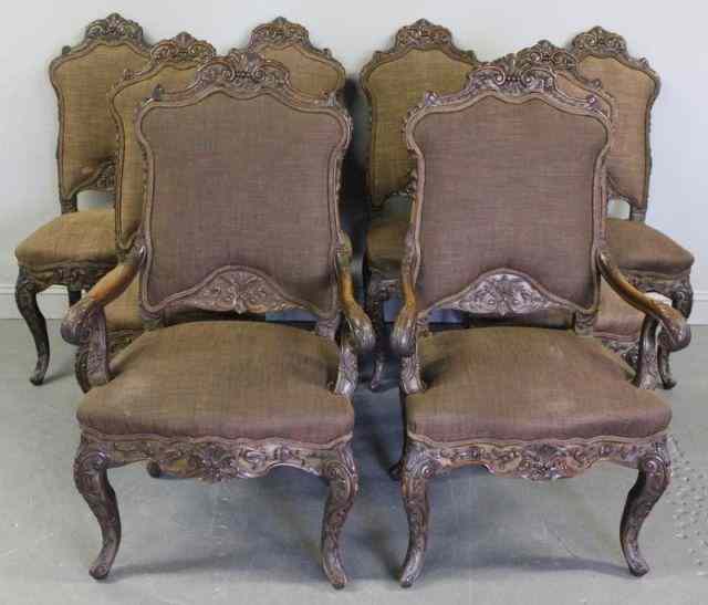 Appraisal: Set of Heavily Carved Louis XVI Style DiningChairs arm chairs