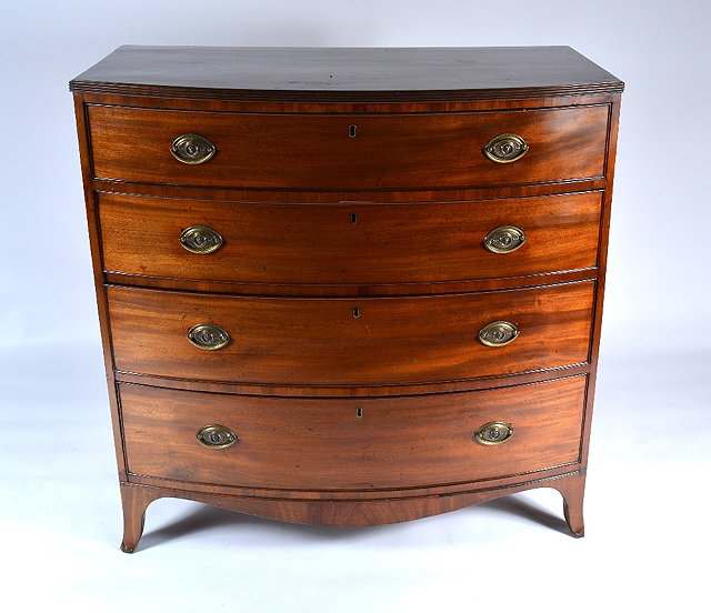 Appraisal: A th Century mahogany bow front chestof four long drawers