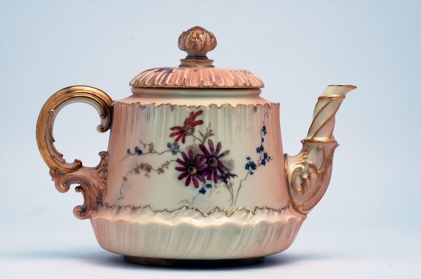 Appraisal: Royal Worcester porcelain teapot circa with floral pattern on yellow