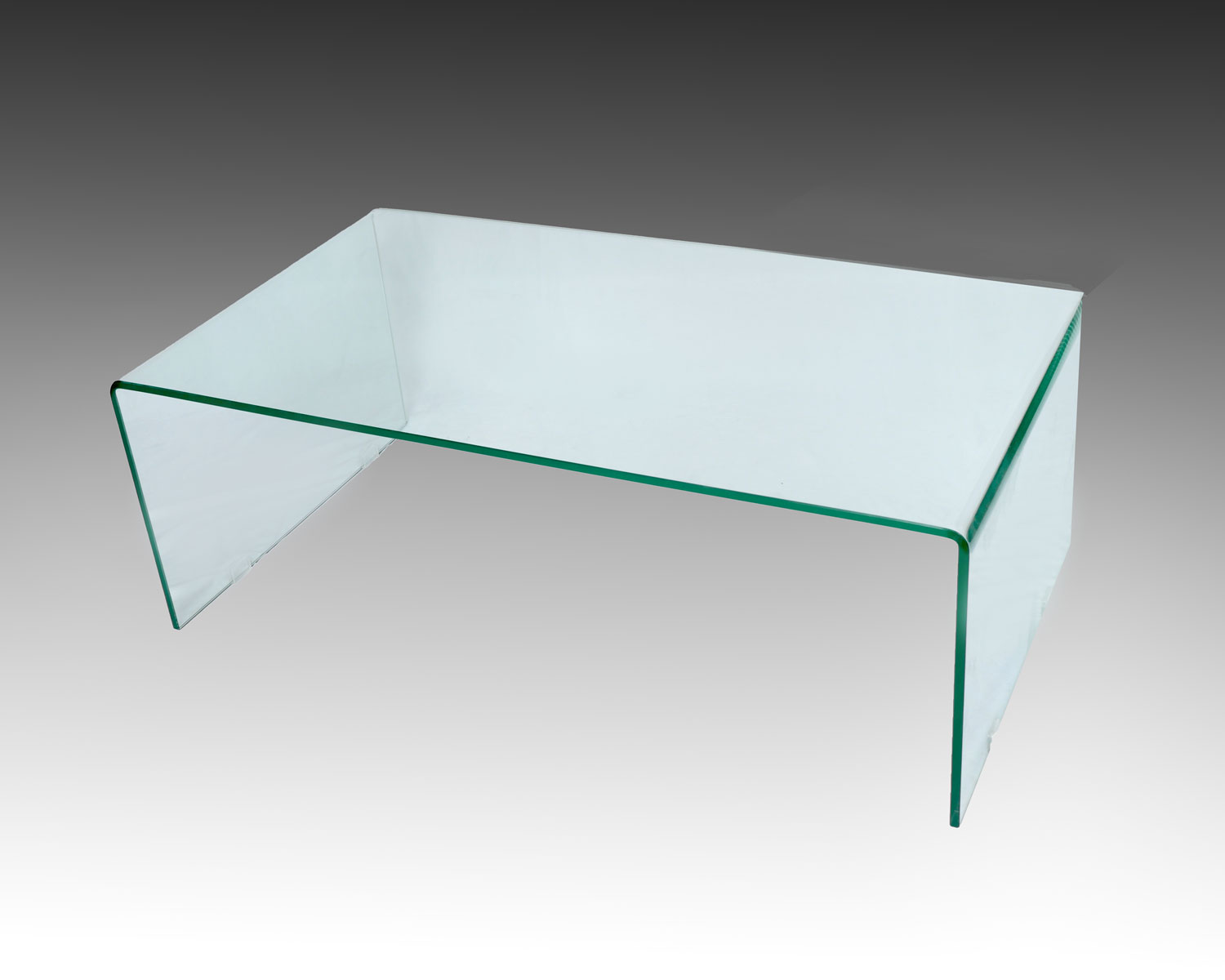 Appraisal: CURVED GLASS COFFEE TABLE Modern bent glass coffee table Approx