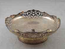 Appraisal: A silver dish with pierced border Birmingham approx cm diameter