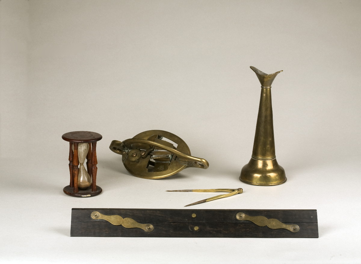 Appraisal: THREE NAVIGATIONAL TOOLS INCLUDING A BRASS AND EBONY PARALLEL RULE