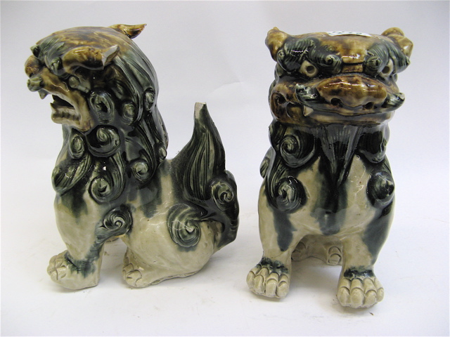 Appraisal: PAIR CHINESE POTTERY FOO DOGS AND A WOOD CHEST The