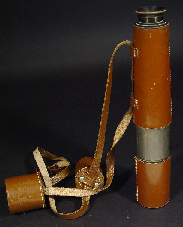 Appraisal: Brass four drawer telescope in a brown leather case extends