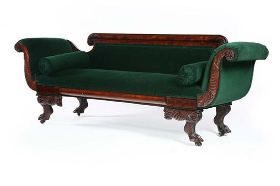 Appraisal: LATE CLASSICAL SOFA American - mahogany Scrolled arms carved cornucopia