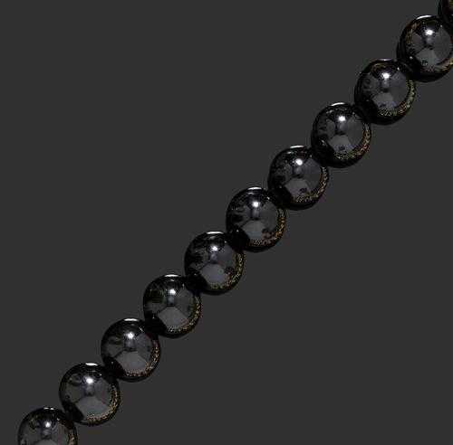 Appraisal: CORAL SAUTOIR Attractive sautoir of black coral beads of ca