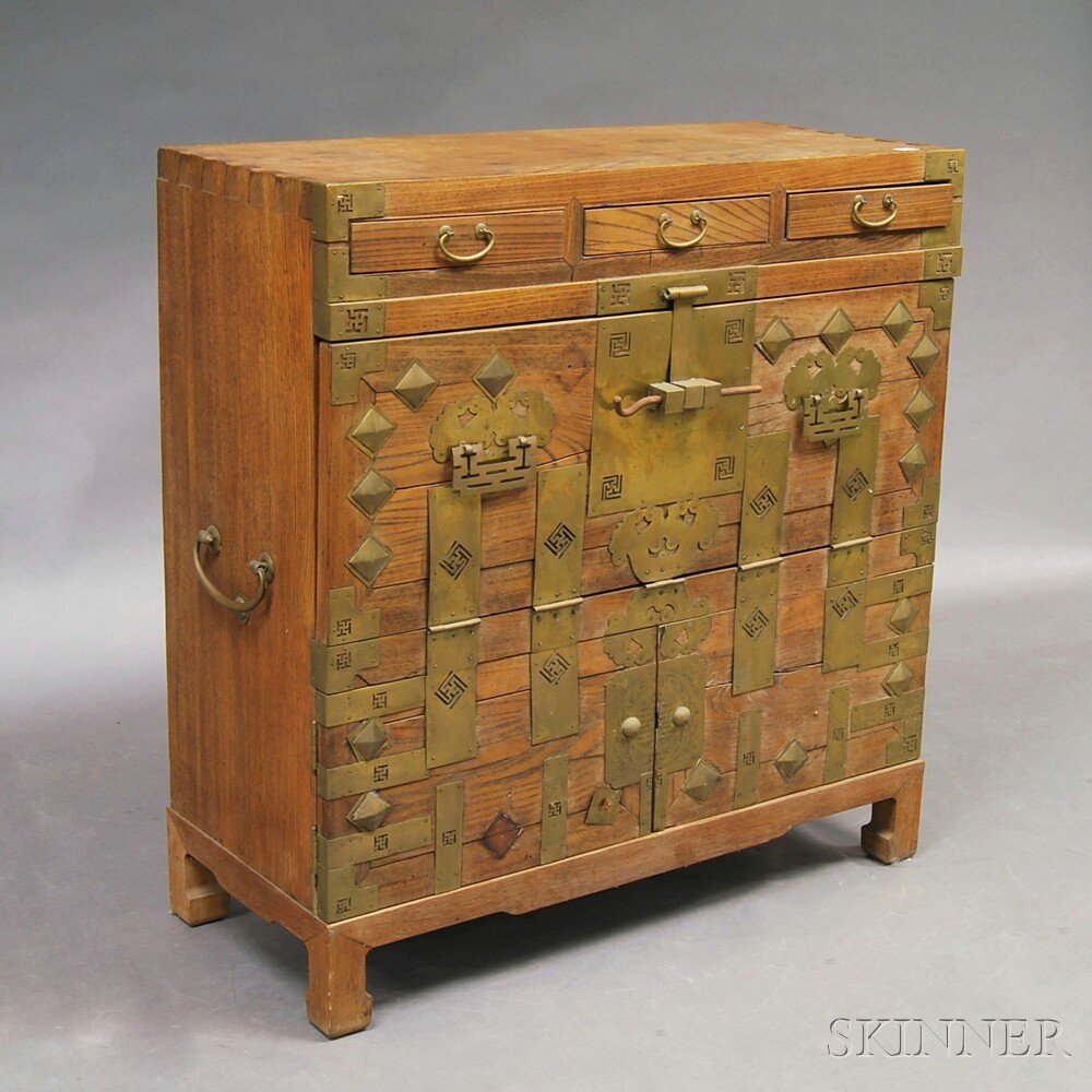 Appraisal: Korean Brass-bound Chest th century with three drawers over a