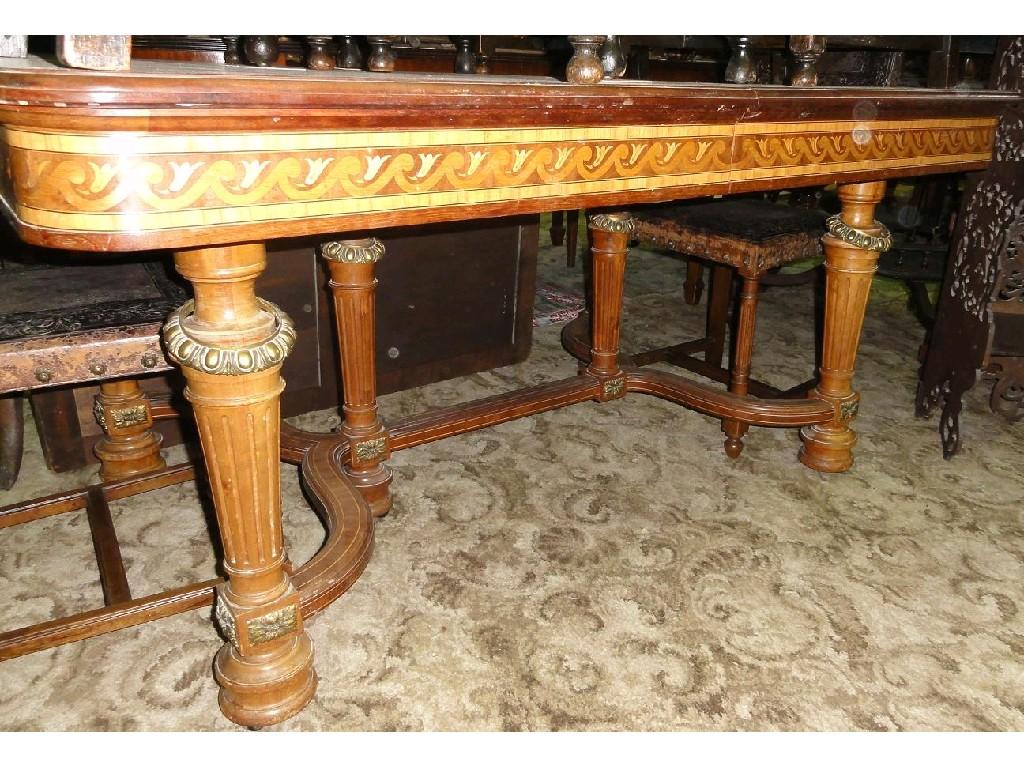 Appraisal: A continental mahogany extending dining table of rectangular form together