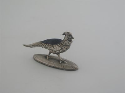 Appraisal: A striding pheasant with naturalistic plumage on a textured base