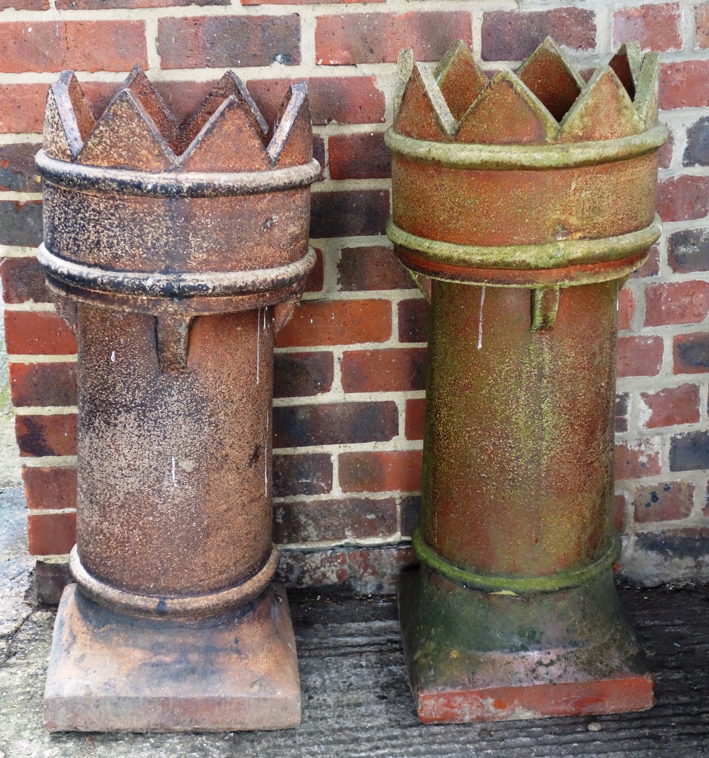 Appraisal: A pair of early th century glazed terracotta chimney pots