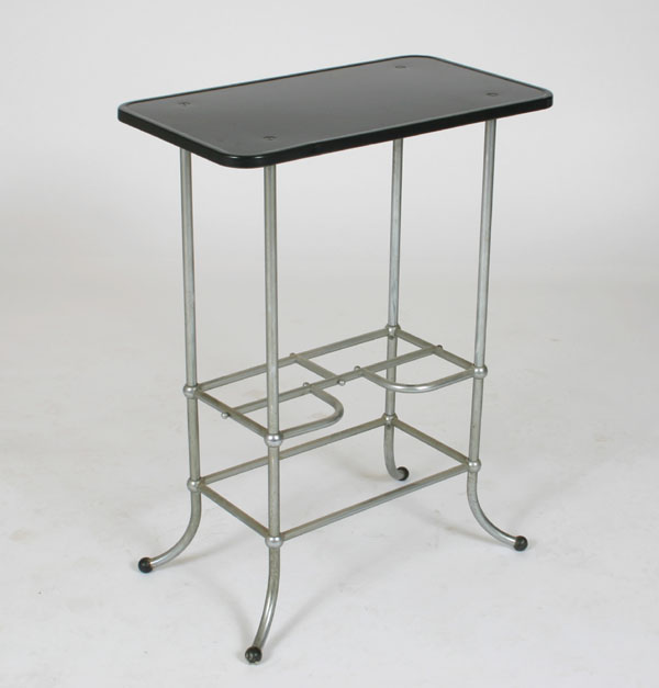 Appraisal: Machine Age stand table French influence aluminum with enamel top