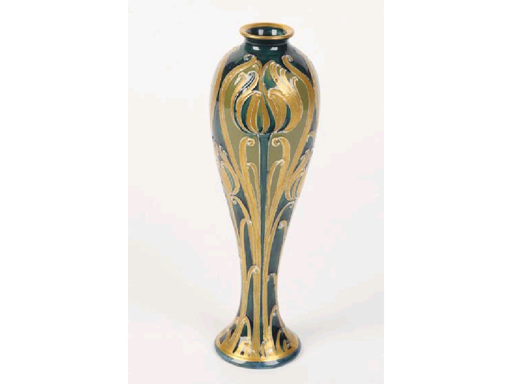 Appraisal: A MACINTYRE VASE with narrow neck and shaped body decorated