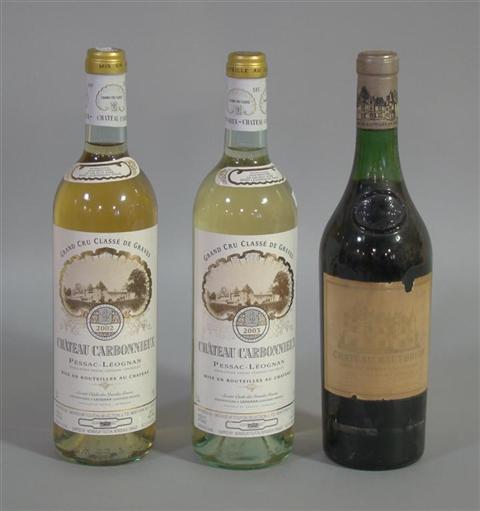 Appraisal: THREE BOTTLES OF MIXED BORDEAUX GRAVES One bottle of Chateau