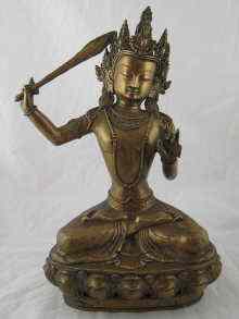 Appraisal: A Tibetan bronze Buddhist figure of the bodhisattva Mandusri ht