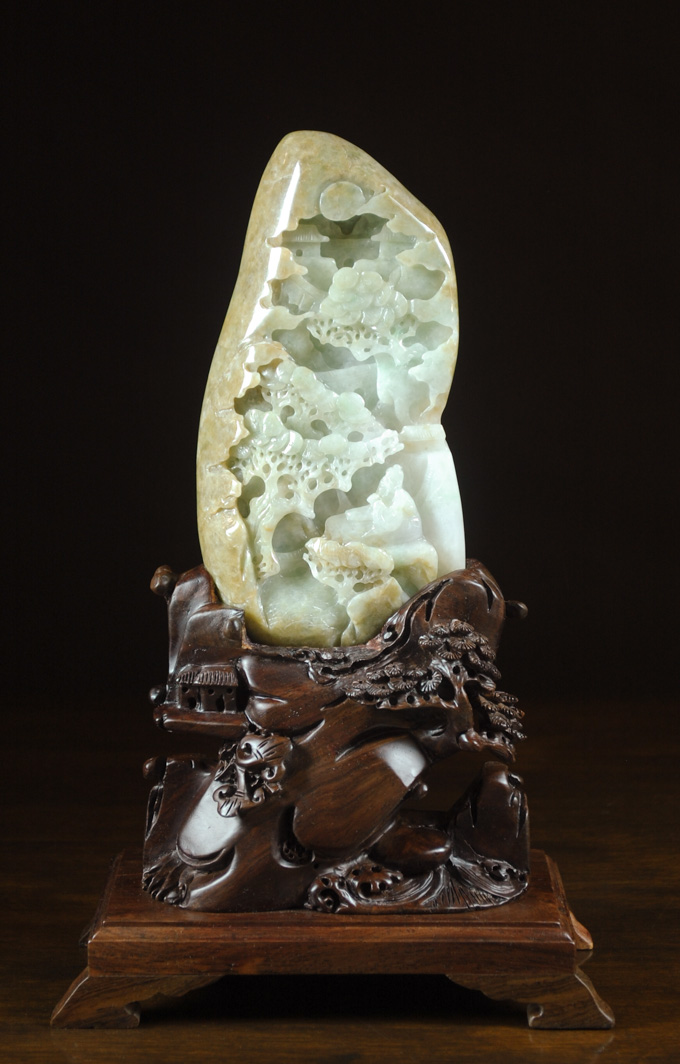 Appraisal: CHINESE CARVED JADEITE BOULDER with conforming wood base Height including