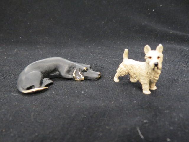 Appraisal: Austrian Bronze Dog Figurines black hound with bone and a