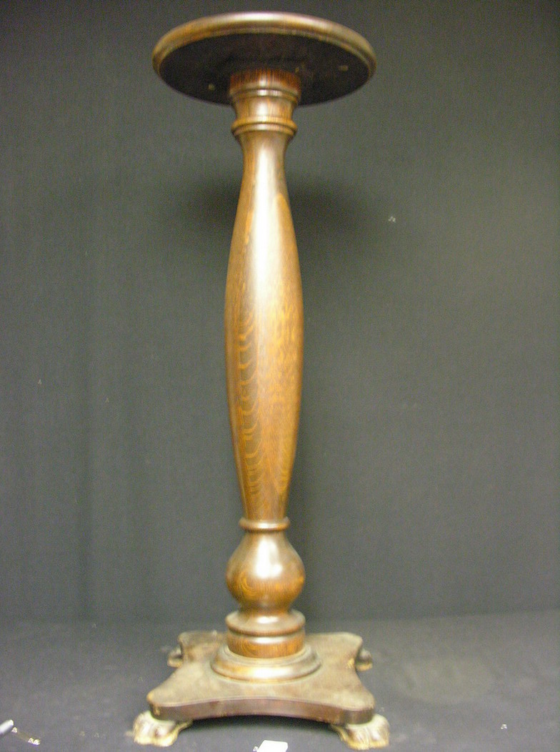 Appraisal: AMERICAN TIGER OAK PEDESTAL TABLE Circa Size with top diameter