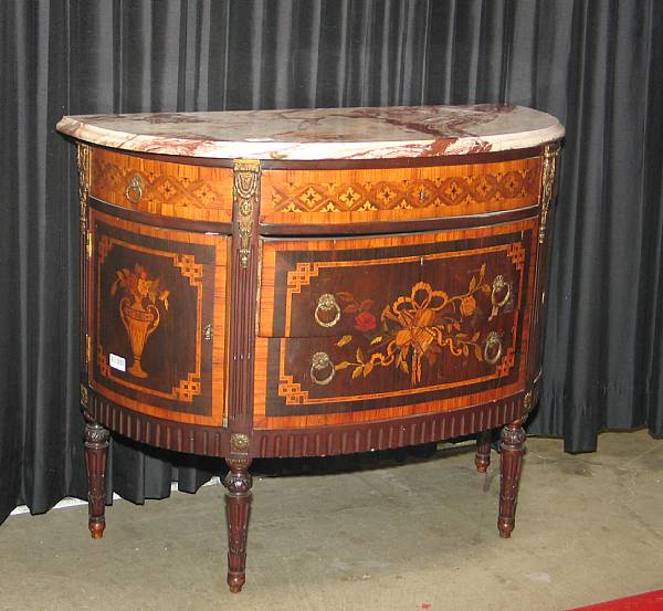 Appraisal: A Louis XVI style gilt bronze mounted marquetry commode first