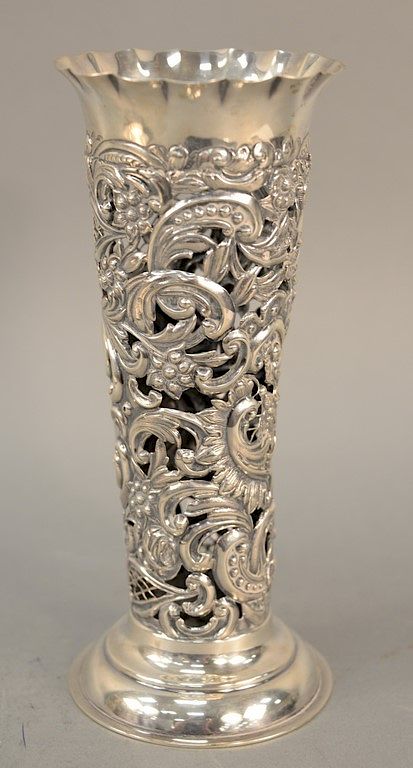 Appraisal: Sterling vase liner open scroll work marked sterling height inches