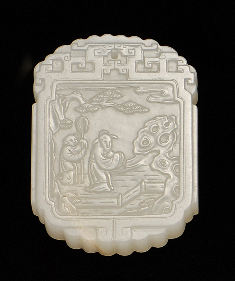 Appraisal: WHITE JADE PENDANT In modified rectangular form With relief carving