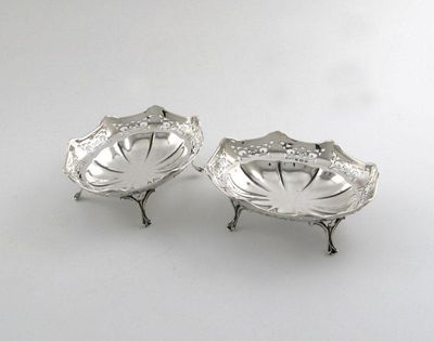 Appraisal: A pair of modern bon bon dishes pierced galleries on