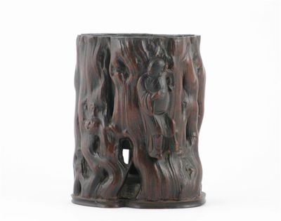 Appraisal: A Chinese root-wood brushpot reticulated and applied with a carved