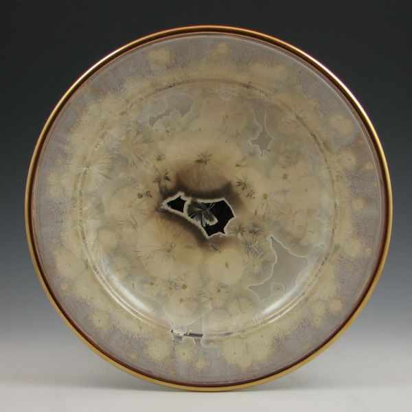 Appraisal: Studio pottery charger with gilt rim and crystalline finish Signed