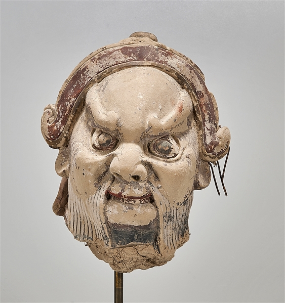 Appraisal: Japanese pottery head with slight existing red and black pigment