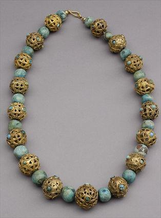 Appraisal: Blue Stone and Gilt-Metal Tribal-Style Necklace