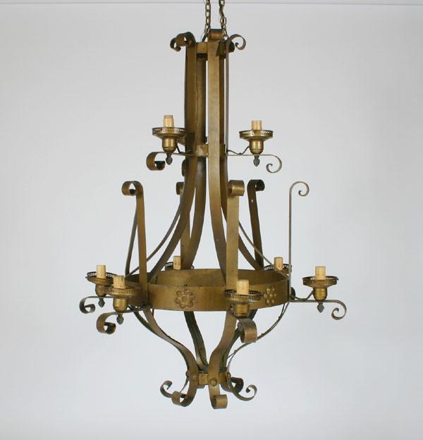 Appraisal: Large cast metal circular -light chandelier concentric bands with geometric