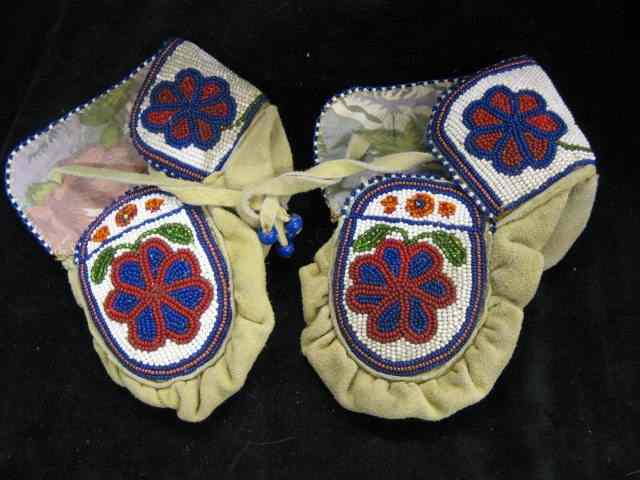 Appraisal: Pair of Indian Mocossins beaded child size