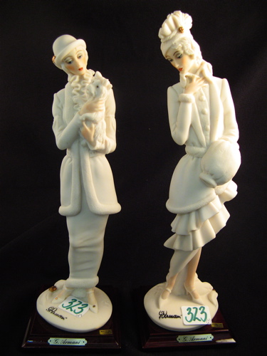 Appraisal: TWO ITALIAN GIUSEPPE ARMANI FIGURAL SCULPTURES unglazed white porcelain tinted