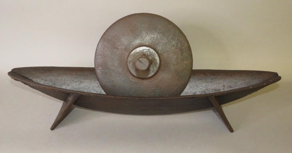 Appraisal: CAST IRON DISC AND TROUGH HERB GRINDERca th century early