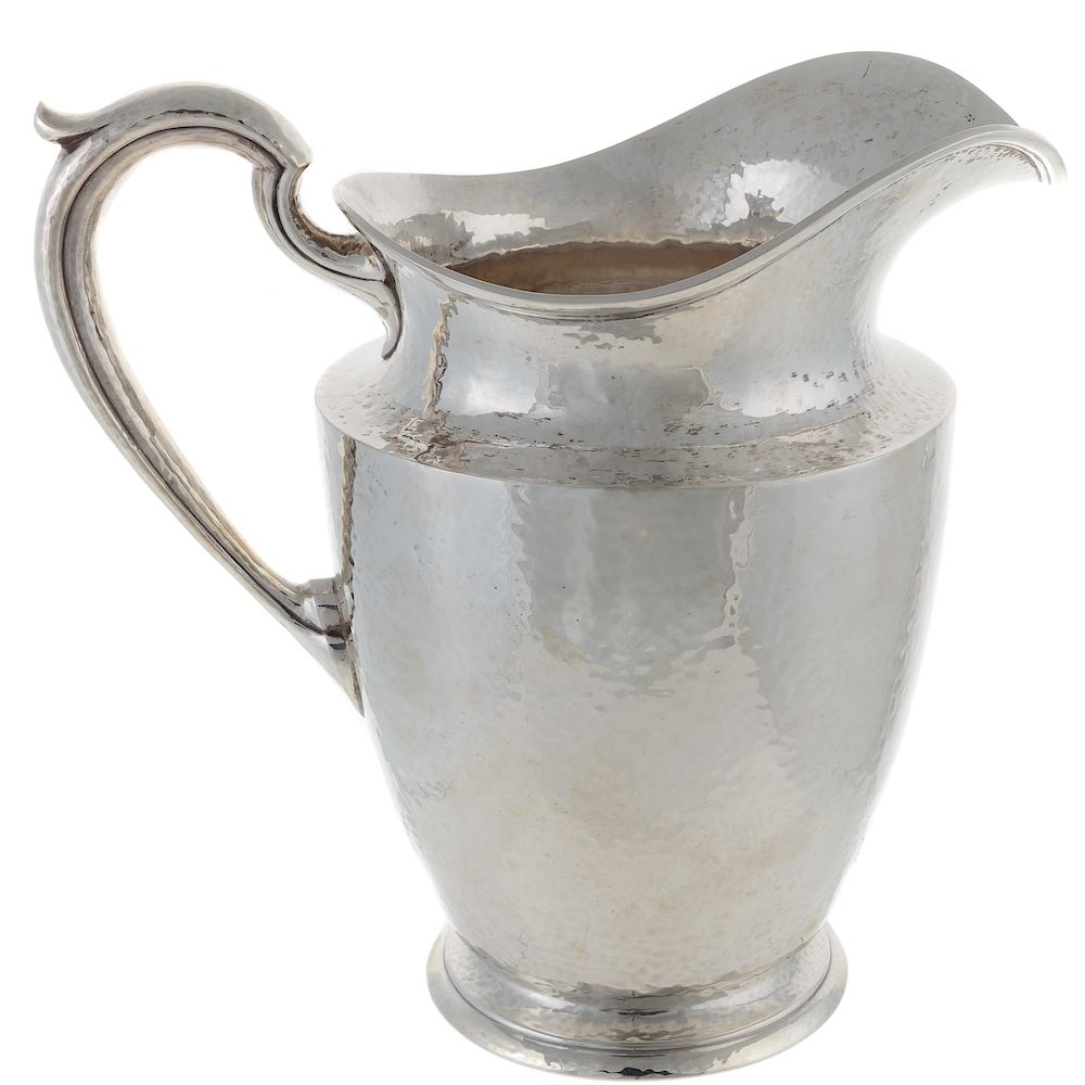 Appraisal: International Sterling Silver Pitcher model B pints hand-hammered baluster-form on