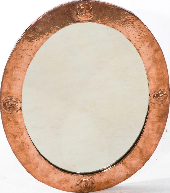 Appraisal: LIBERTY CO ARTS CRAFTS COPPER MIRROR the oval mirror-plate within