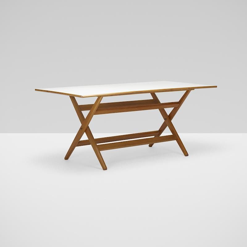 Appraisal: Paolo Tilche Poney dining table Paolo Tilche Poney dining table